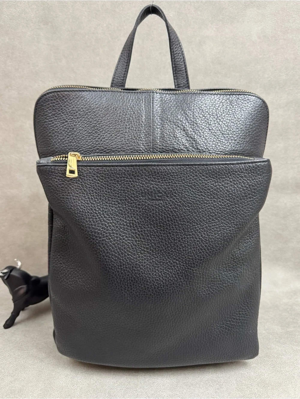 Black Pebbled Leather Backpack with Gold Zipper